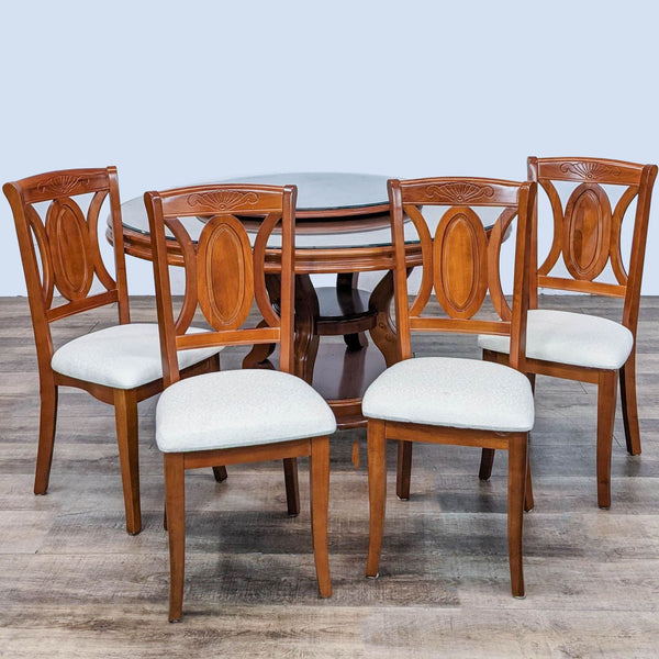 Alt text 1: Reperch 5-piece contemporary dining set, round wood table with a glass top and lazy Susan, and four chairs with upholstered seats.