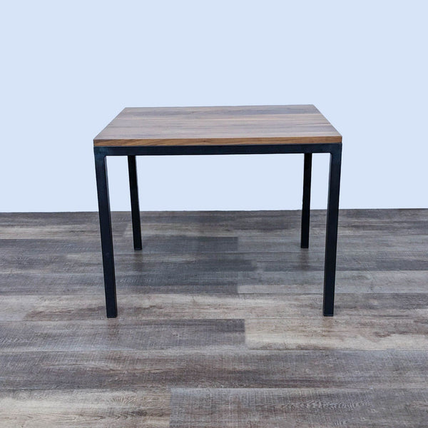 Solid walnut top Parsons dining table with a natural steel base by Room & Board. Dining Table category.