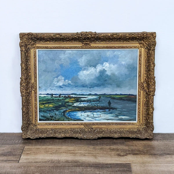 1. Oil painting depicting a stormy beach landscape, signed by artist, in an ornate gold frame displayed against a white wall.