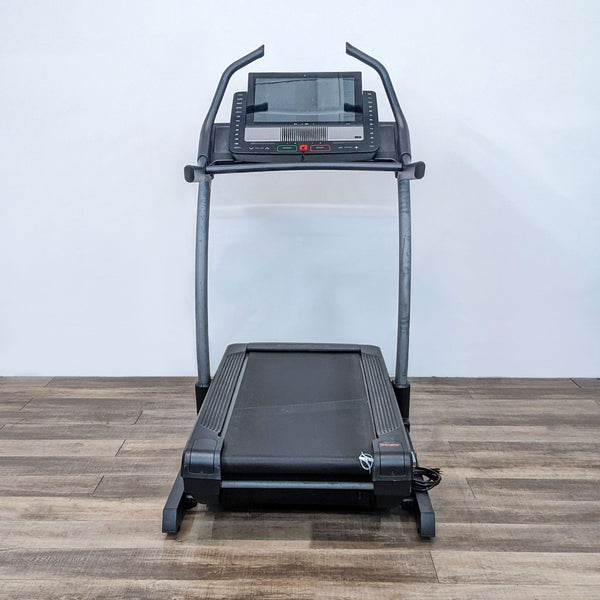 Lightly used NordicTrack treadmill with sturdy frame and console, ideal for home or gym.