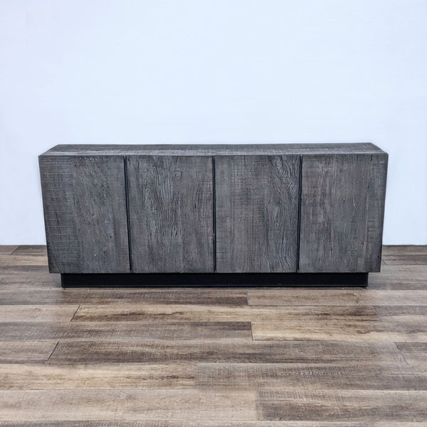 Alt text 1: A Restoration Hardware sideboard in a terra reclaimed peroba finish, designed by Thomas Bina, closed doors, on wood flooring.
