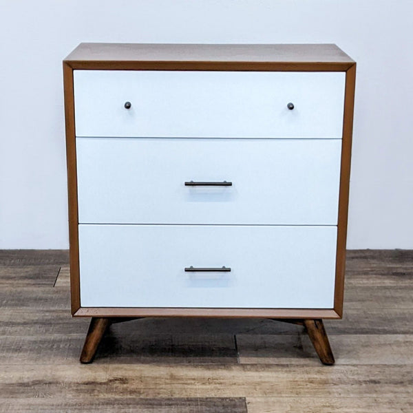 Oliver Space mid-century modern dresser with warm wood frame and three white drawers, metal handles, angled legs.