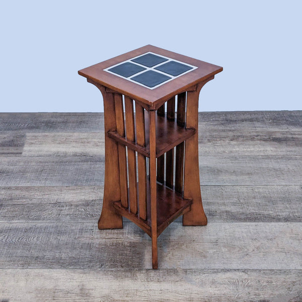 Ethan Allen Mission-style side table with four ceramic tiles on top and vertical slat sides on a wooden floor.