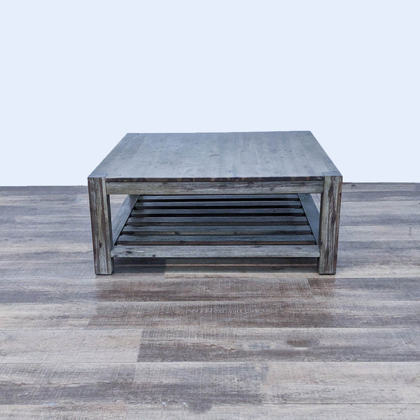 Distressed taupe finish coffee table with slatted shelf, by Macy's Furniture Gallery, with rustic appeal.