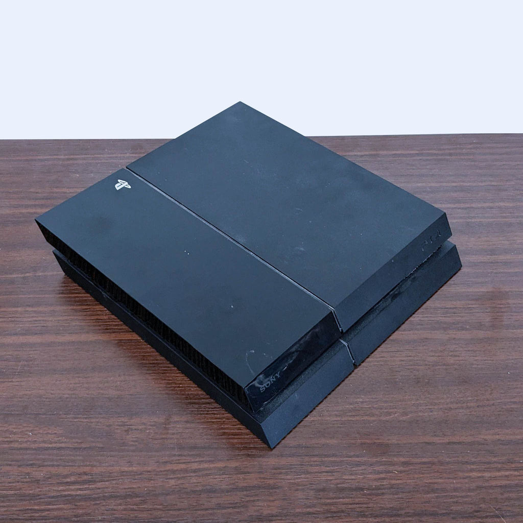 Sony PlayStation 4 Console - Sleek Black Design for Endless Entertainment