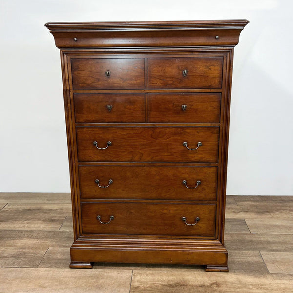 Louis Philippe style 6-drawer chest by Thomasville with dovetail joints, closed drawers, in a wooden finish.