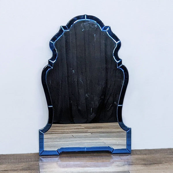 1. Mirror Image Home brand mirror featuring a blue beveled frame with a classic shape against a wooden floor and white wall.