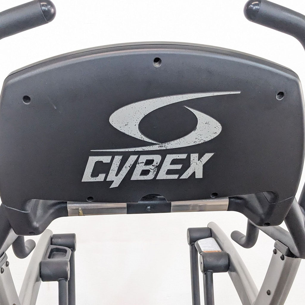 Cybex logo prominently displayed on the back panel of an Arc Trainer machine, indicating brand identity.