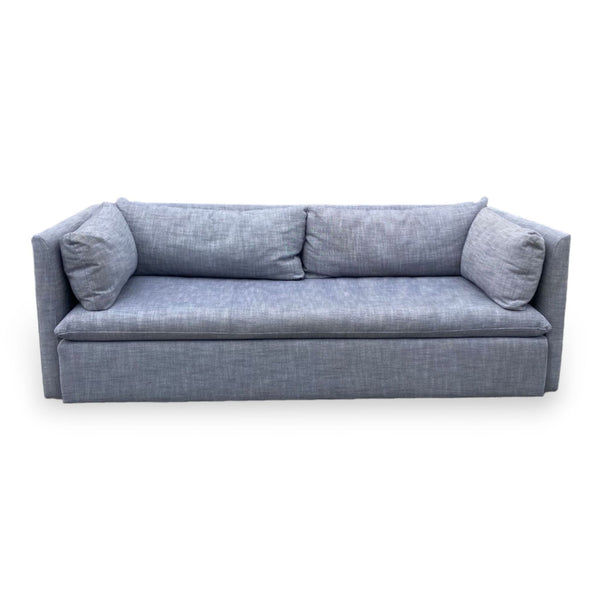 Alt text 1: Blue three-seat West Elm shelter sofa with a sleek linen weave finish, tapered arms, and no visible feet.