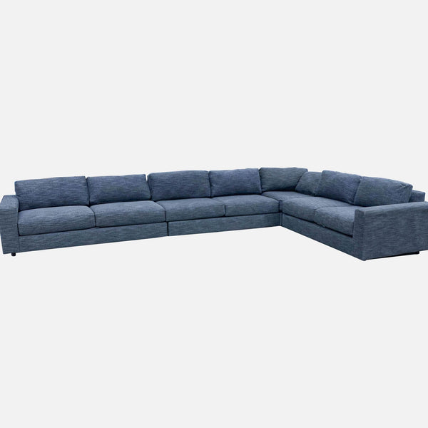 1. "Charcoal heather tweed West Elm sectional with clean lines and block arms."