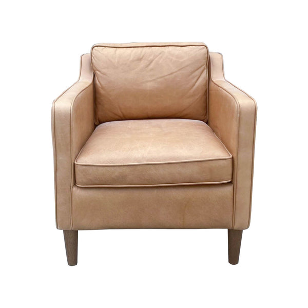 1. Plush Hamilton lounge chair by West Elm with leather upholstery and wooden feet, isolated on white background.