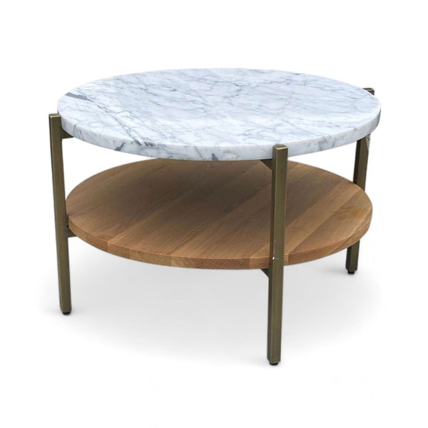 Reperch coffee table with white marble top and golden brass frame, featuring natural oak shelving.