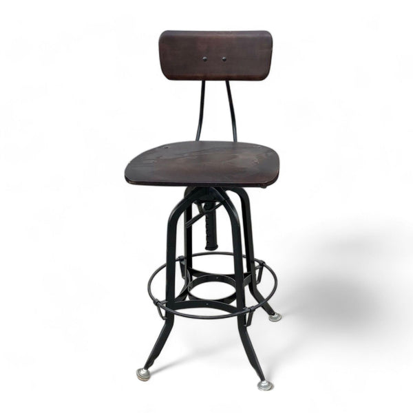 1. Wood and black metal industrial-styled swivel stool with a round seat and a low backrest on a white background, by Reperch.