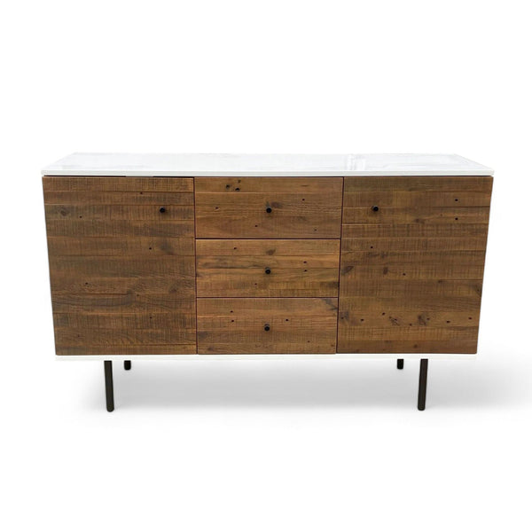 1. West Elm sideboard featuring a modern design with a reclaimed wood finish and black metal legs, closed front view.