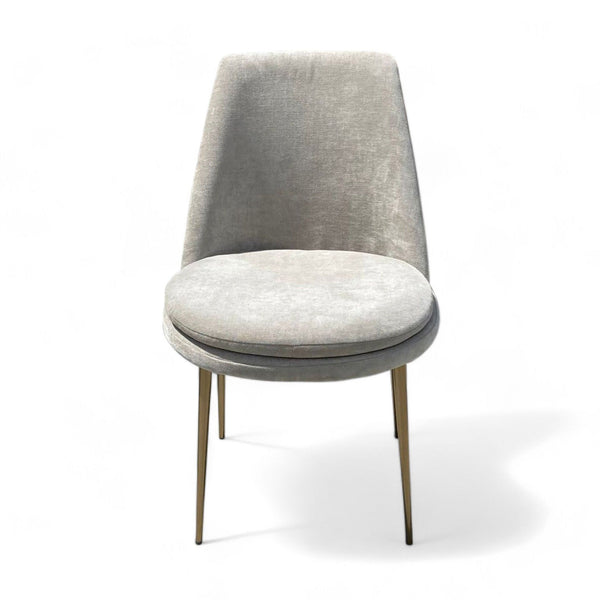 West Elm modern grey dining chair with sleek metal legs.