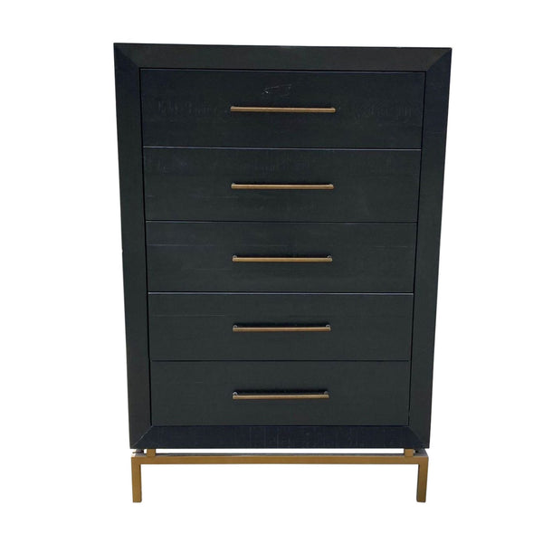 1. Modern West Elm dresser with five drawers, black finish, and brass handles against a solid background.