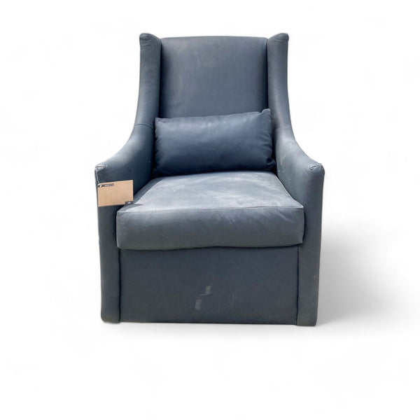 West Elm Kids Graham glider with high back and leather upholstery, featuring wrapped cushions and a lumbar pillow.