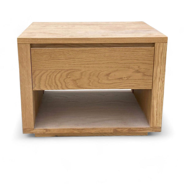 Oak nightstand from Williams Sonoma with drawer and open shelf, end table category, on white background.