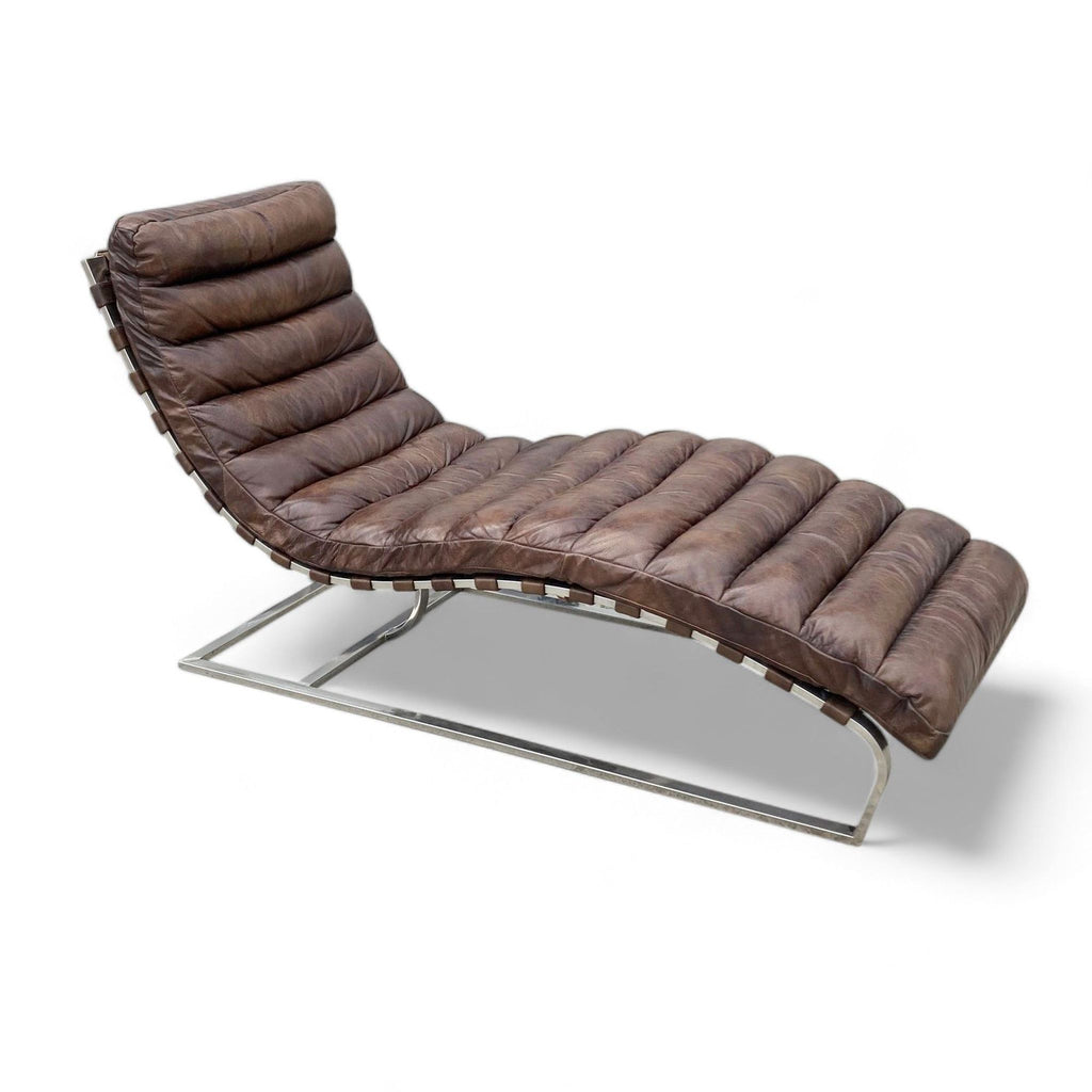 Restoration Hardware's Oviedo chaise with leather strap suspension and stainless steel base, upholstered in tufted leather.