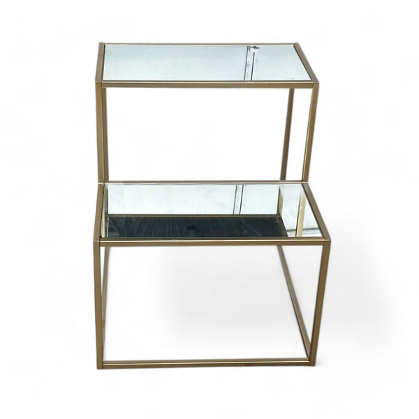 Reperch brand end table with a gold frame and two transparent glass shelves.