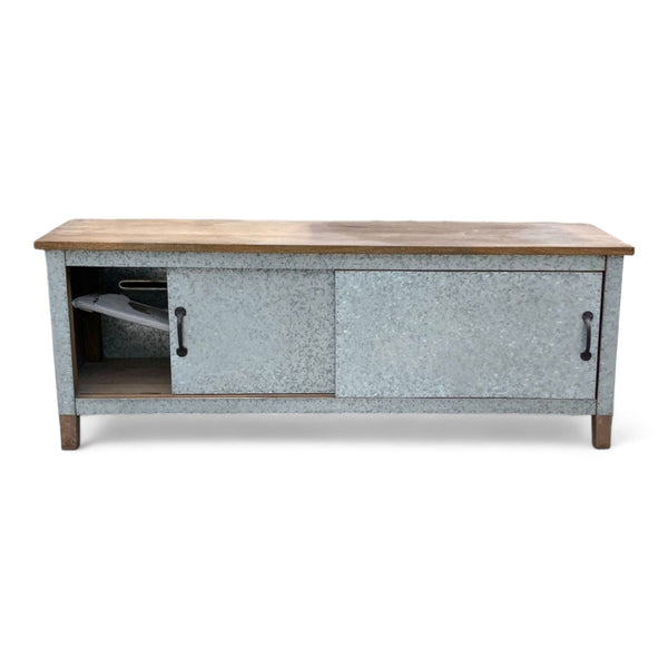 1. Pottery Barn sideboard with galvanized metal doors and a visible adjustable shelf inside, on a white background.