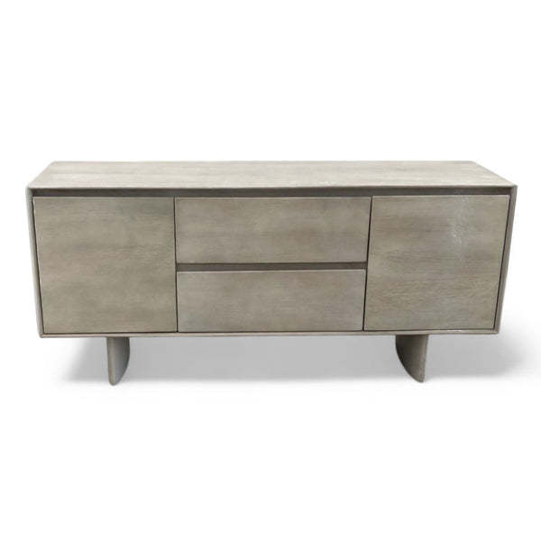 Alt text 1: Mango wood sideboard by Williams Sonoma featuring two closed compartments and two centered drawers, styled in a minimalist design on short legs.