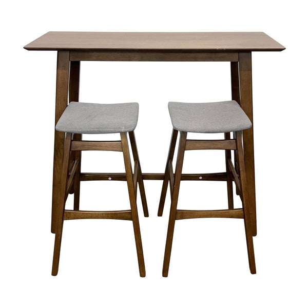 1. "Noble House's Jackie 3 piece bar set with a rectangular wooden table and two upholstered gray barstools with splayed legs."