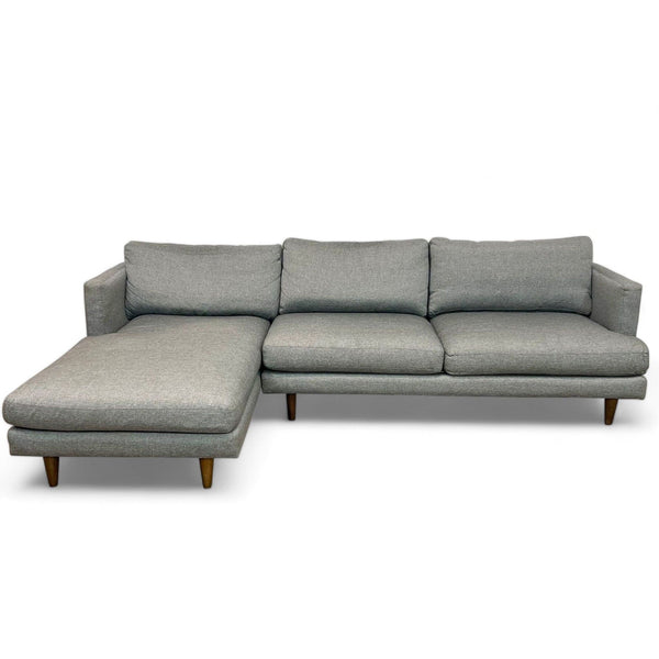 Room & Board low profile sectional with left-facing chaise in graphite fabric.