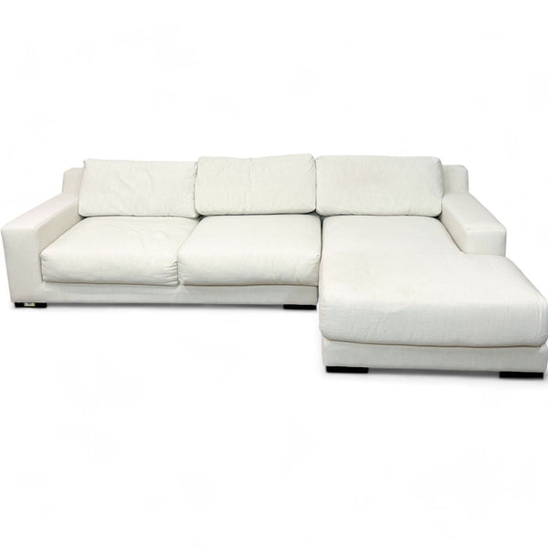 West Elm modern white sectional featuring a low-profile design and track arms with plush sink-in cushions. Washable covers included.