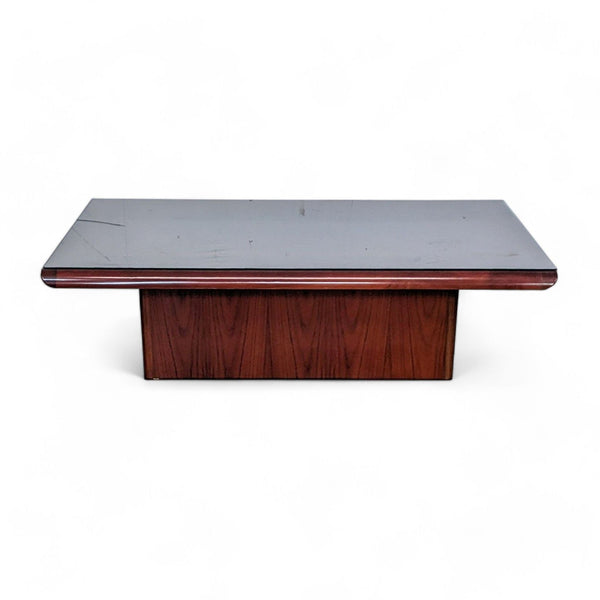 Reperch brand coffee table with glass protective top and wooden base on a white background.