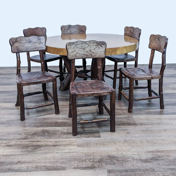 1. "Reperch 7-piece dining set featuring a Saman wood round table with cross-sectioned tree trunk top and branch base, and six matching chairs with leather seats."