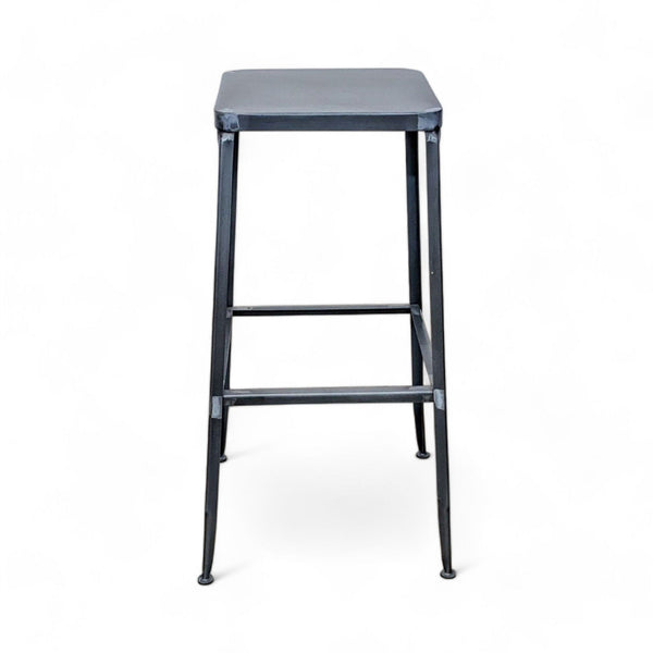 1. CB2 Modern Metal Flint Barstool with a square seat and minimalist design against a white background.