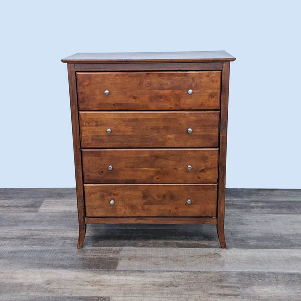 Reperch brand transitional dresser with clean lines, four drawers and silver knobs, against a grey background.