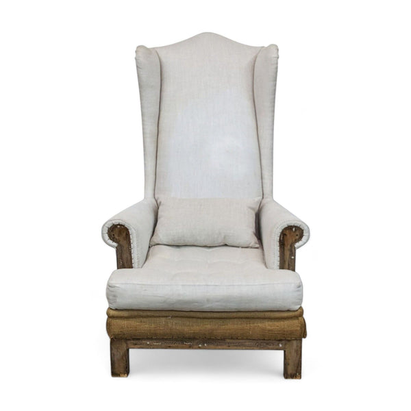 Restoration Hardware Wingback Deconstructed Chair with exposed wood frame and textured linen upholstery, front view.