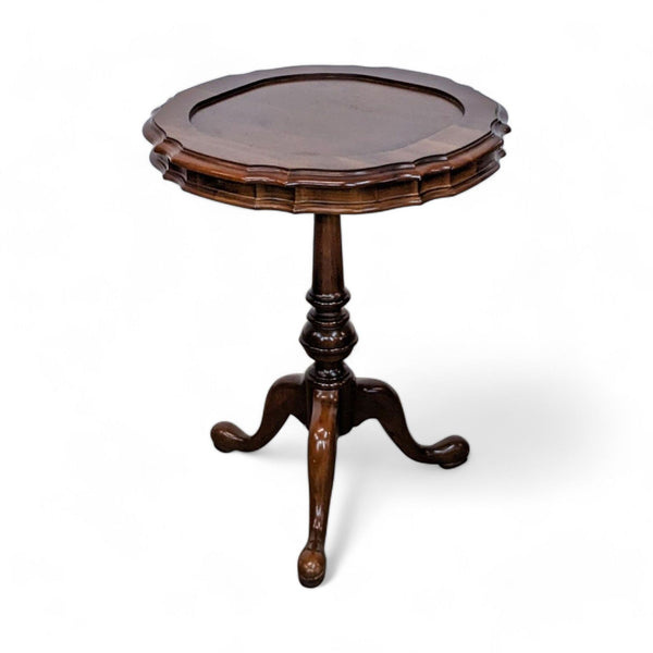 Ethan Allen pedestal base end table with a round, scalloped-edge top and three curved legs.