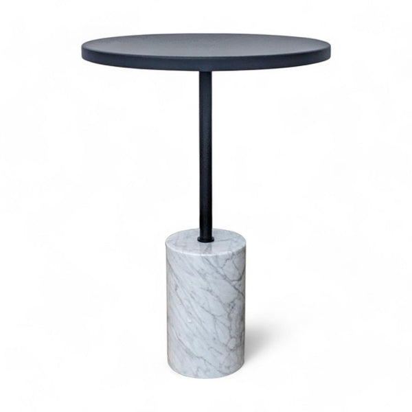1. Narro side table by Article with black round top and marble base isolated on white background.