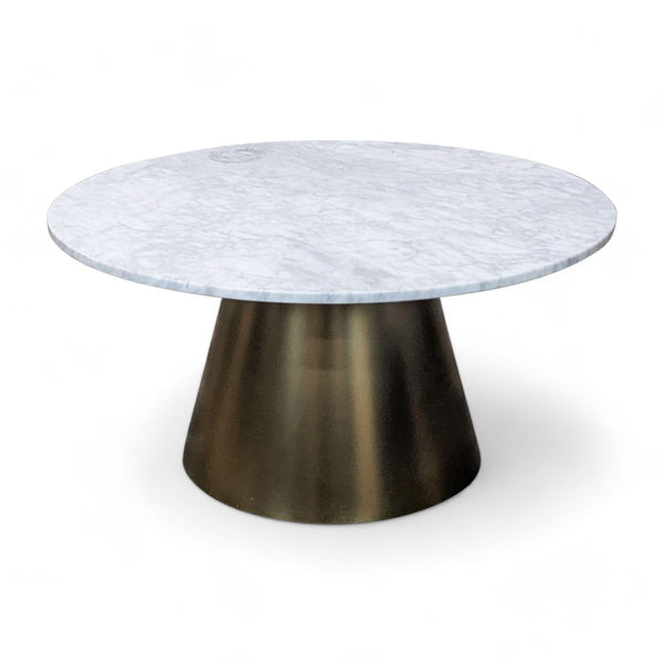 1. Article brand coffee table with a gold metal conical base and a round white marble top on a white background.