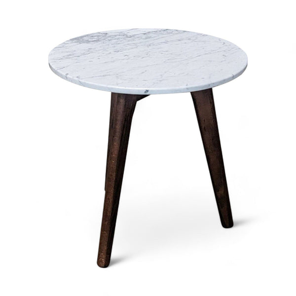 1. Round side table with Italian Carrara marble top and walnut-finished American White Oak legs by Article.