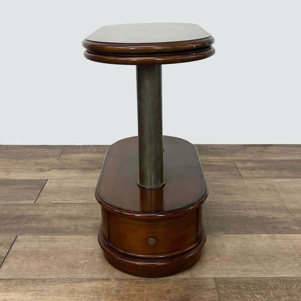 Reperch two-tier end table with closed bottom drawer on a wooden floor.