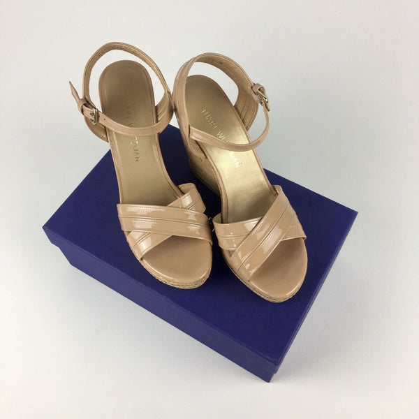 1. New Stuart Weitzman patent leather wedges with cork heels, size 7.5, displayed on original blue box.