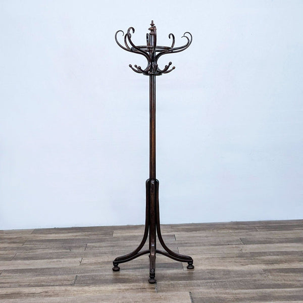 Alt text 1: Antique Thonet art nouveau wooden coat rack with eight intricate S hooks on a decorative top, standing on a three-legged base.
