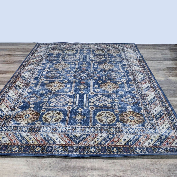 Safavieh Bijar 8’x10’ Persian-style rug with blue and cream patterns on a wooden floor, showing mild distressing and texture.