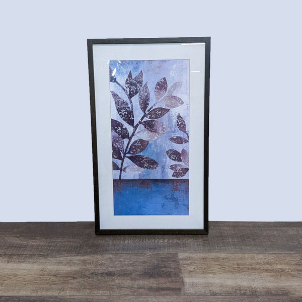 Art.com framed floral print in blues and purples, standing against a neutral wall on a wooden floor.