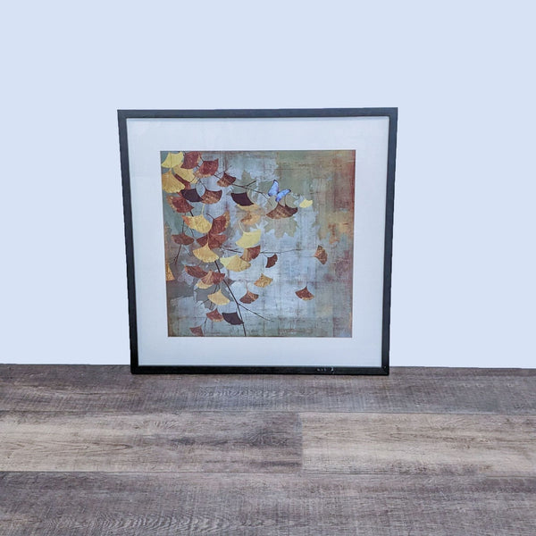 Alt text 1: Framed floral painting with autumn leaves on a textured background, crafted by Art.com, displayed against a plain wall and wooden floor.