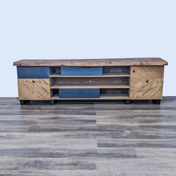 Reperch Entertainment Center closed view, showcasing wooden and blue metal sliding doors and feet on a floor.