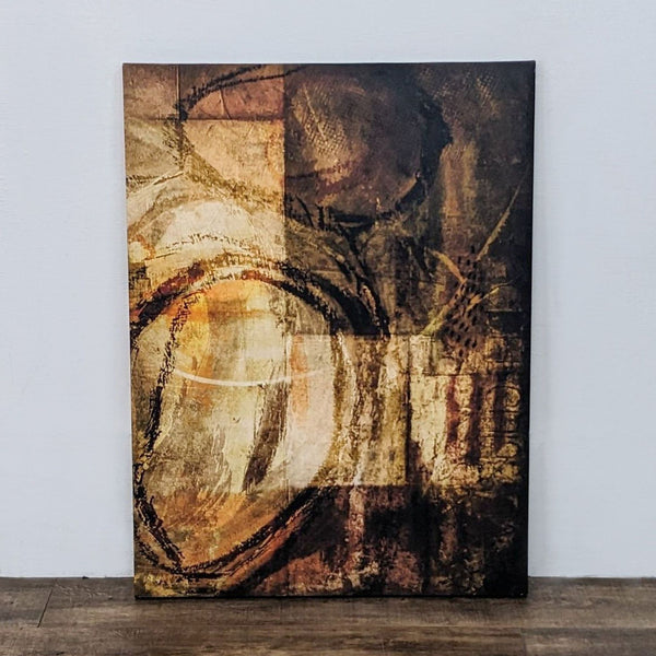 Reperch abstract canvas print with earthy tones, textured patterns, and dynamic shapes, displayed against a white wall.