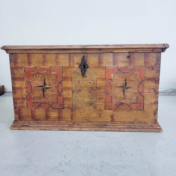 Alt text 1: Antique Reperch trunk from 1870s with ornate metalwork on patterned wood.