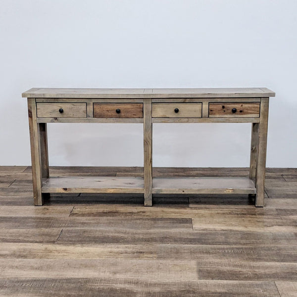 Reperch brand wooden console table with multiple drawers, rustic finish, displayed against a white wall on a wooden floor.