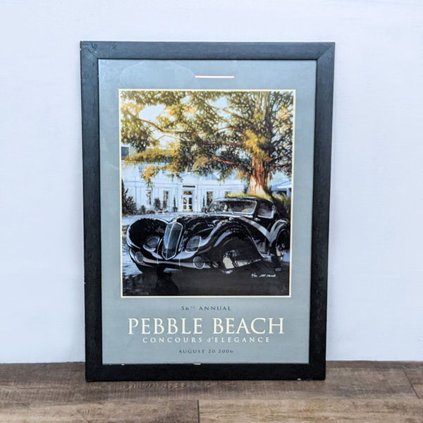 1. "Framed event poster of 56th Annual Pebble Beach Concours d'Elegance with a classic 1936 Delahaye car illustration, by Reperch."