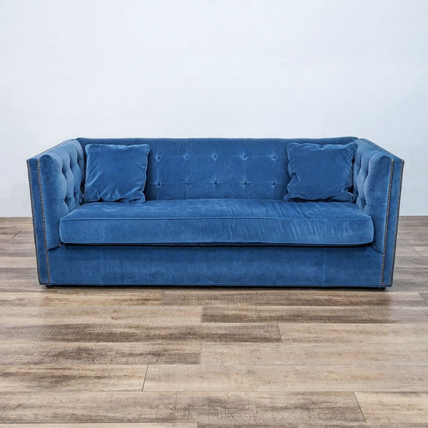 Bassett 3-seat tufted back and sides sofa with shelter arms and gold nail head detail, in a blue fabric.